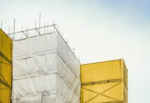 조합 임원 교체 때 인계 의무화 …정비사업 지연 방지 brown cardboard boxes on gray concrete floor