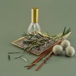 바쁜 일상 속, 내게 맞는 대체요법 찾기…실생활 팁과 주의할 점은? a bottle of perfume sitting on top of a table