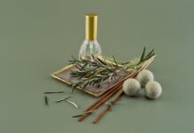 바쁜 일상 속, 내게 맞는 대체요법 찾기…실생활 팁과 주의할 점은? a bottle of perfume sitting on top of a table